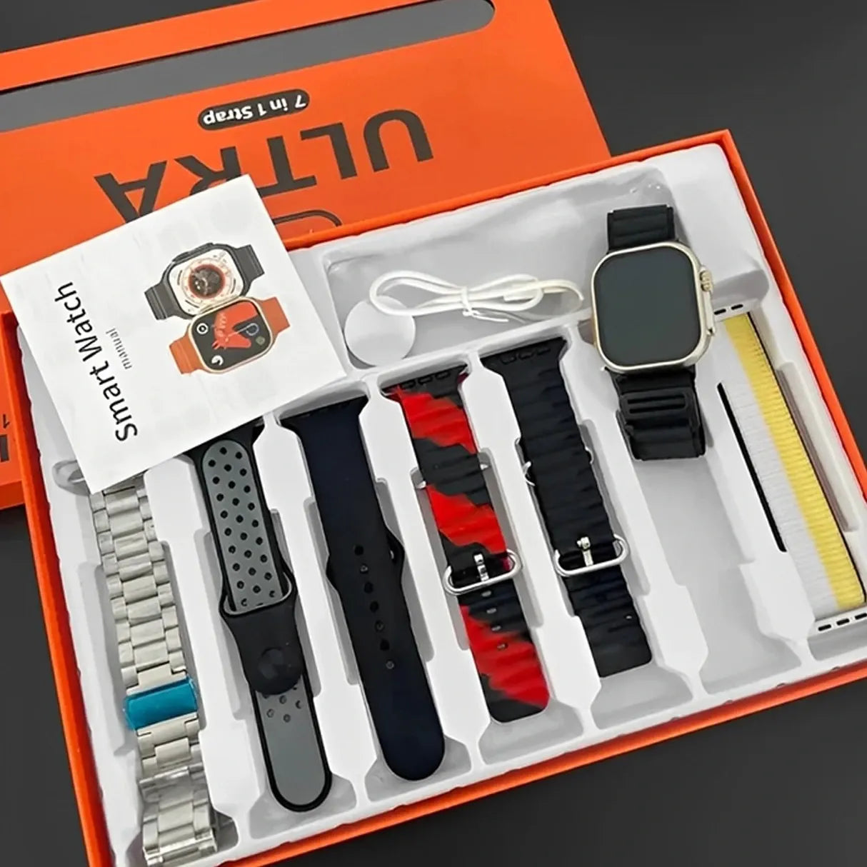 Smart watch with interchangeable straps in a box labeled 'ULTRA'.