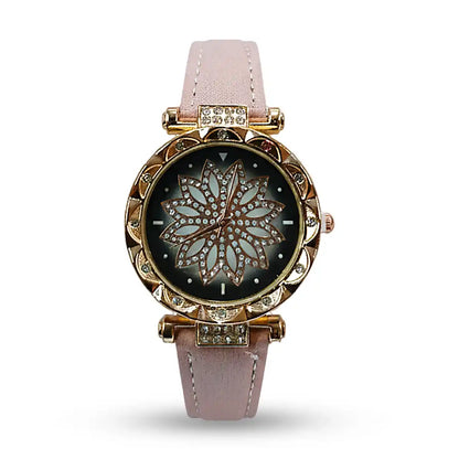 A68 Watch with pink strap and decorative face on a white background