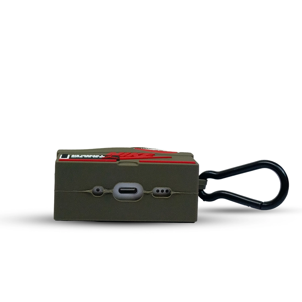 Green sneaker design silicone case charging port  with a black carabiner on a white background