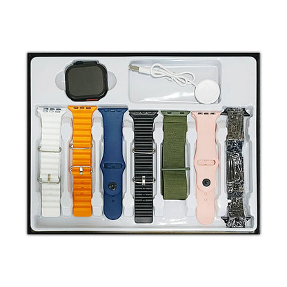 Collection of smartwatch bands and accessories in a box on a white background