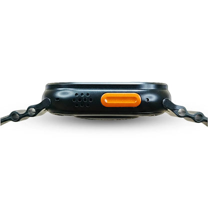 G500 close-up of a black electronic device with an orange button on a white background