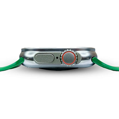 Close-up of a metallic device with green strap on a white background