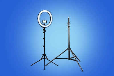 Ring light with stand on a blue background